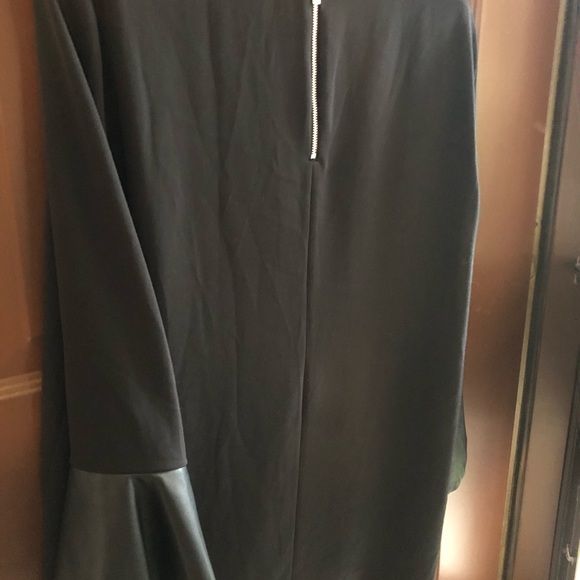 Calvin Klein leather bell cuffs. Exposed zipper on back.  Never worn - Picture 2 of 4
